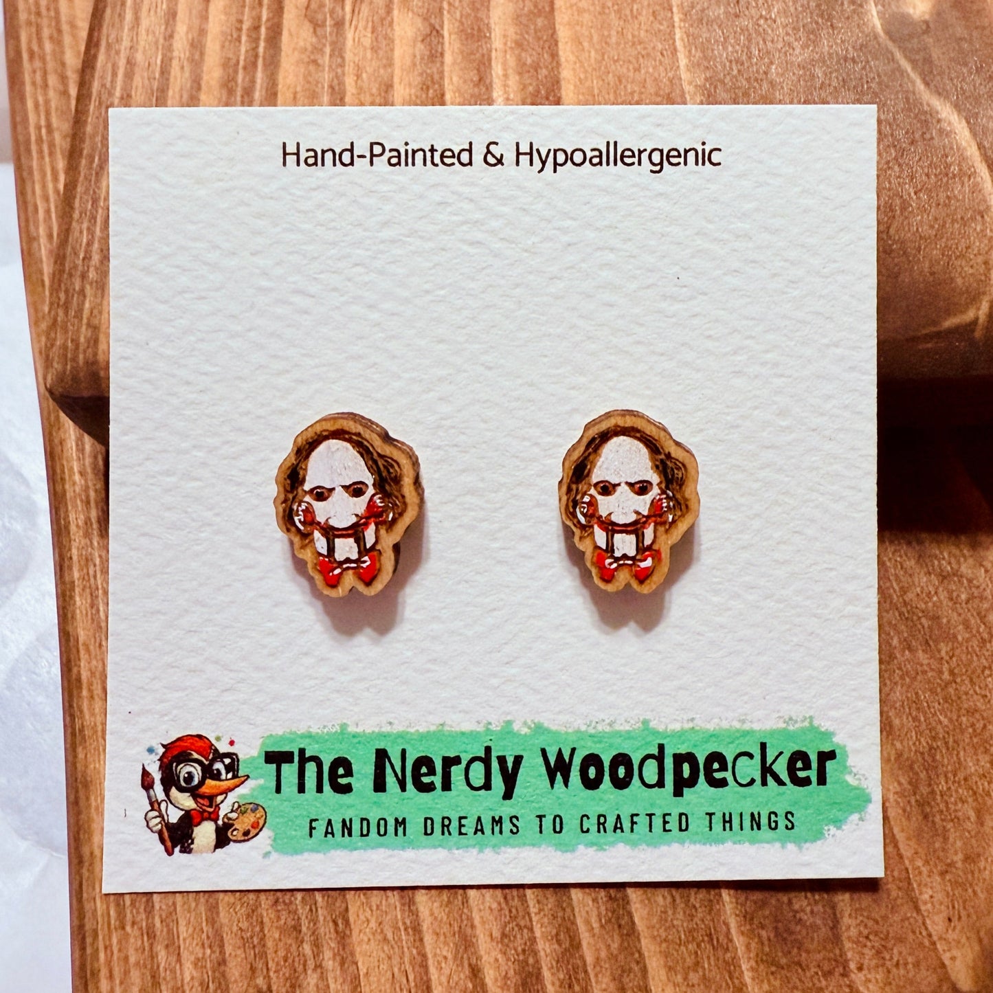 JIGSAW Horror Stud Earrings — Hand-Painted | Spooky Earrings | Creepy Jewelry | Scary Cosplay | Fandom Gift | Halloween Stocking Stuffers | Horror Fan Gift